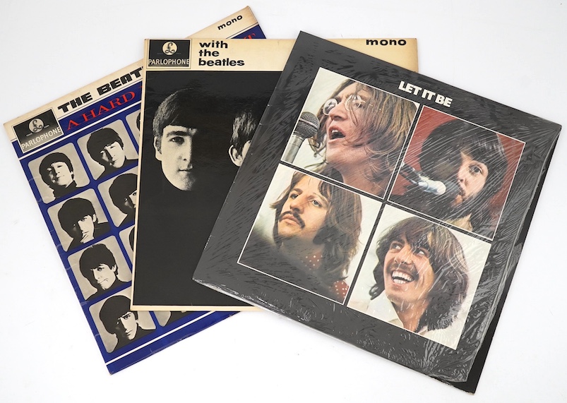 Three The Beatles LP record albums; Let It Be, PCS7096, With The Beatles, PMC 1206, XEX 447-1N, A Hard Days Night, PMC 1230, XEX 481-3N. Condition - fair to good